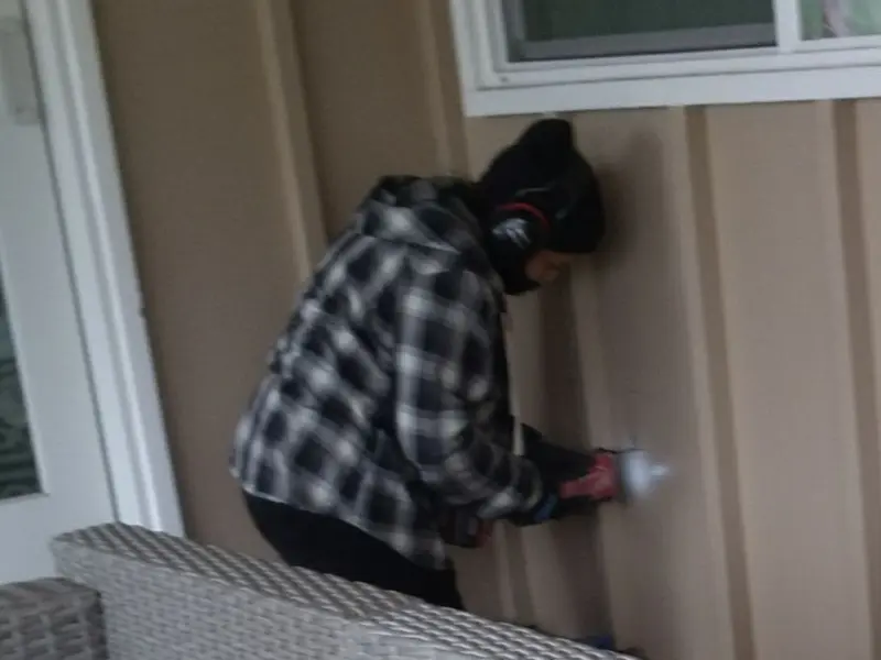 Professional electrician installing an exterior outlet in Gillette